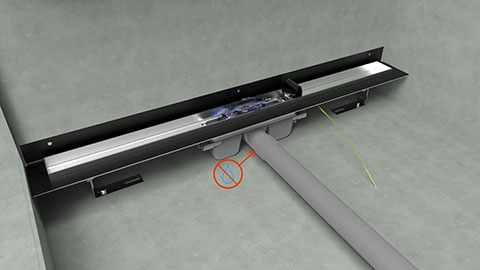 Installation du caniveau de sol contre le mur